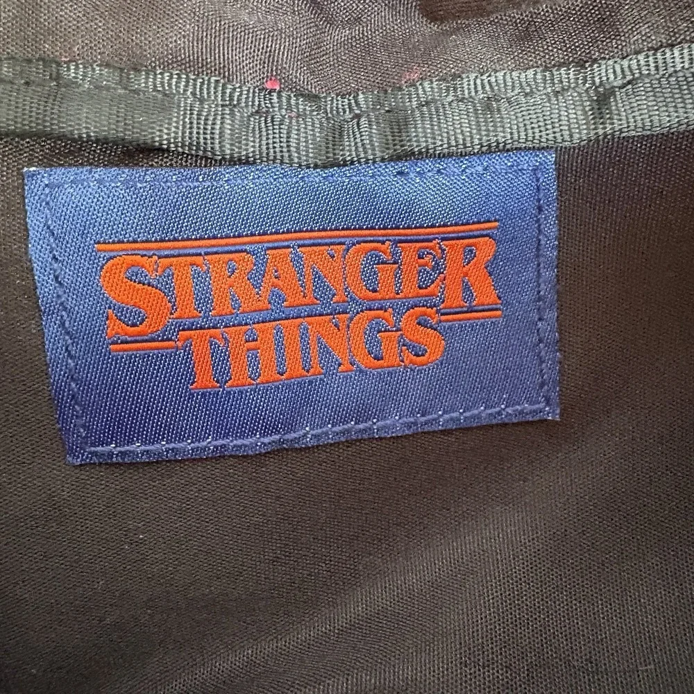Stranger Things Hawkins 1985 Fanny Pack & Hawkins Horrors Book Lot Netflix